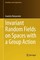 Invariant Random Fields on Spaces with a Group Action