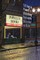 Sitting in Powell's Watching Burnside Dissolve in Rain